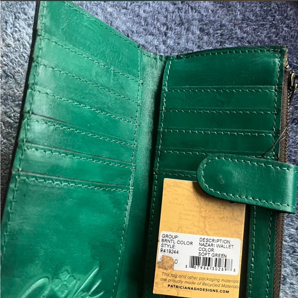 Patricia Nash Nazari tooled leather bifold wallet.